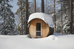Round Barrel Sauna in the Snow